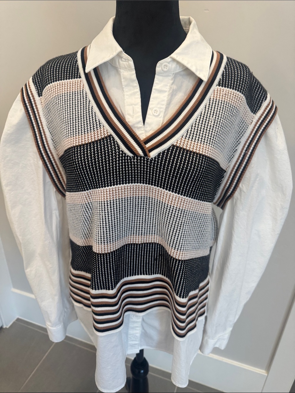 Women’s sweater/ blouse combo.